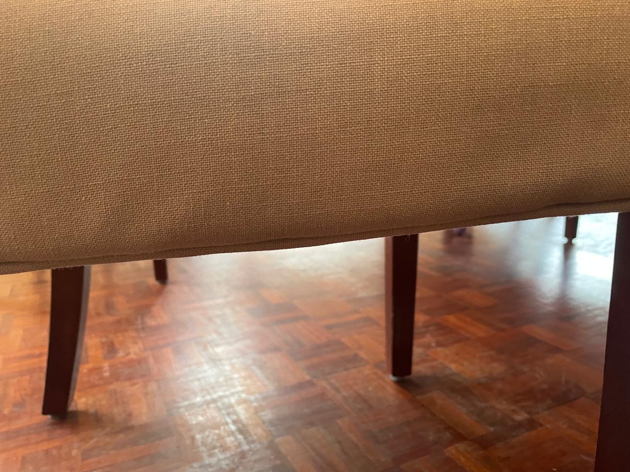 Close-up of the lower edge and piping on a dining chair