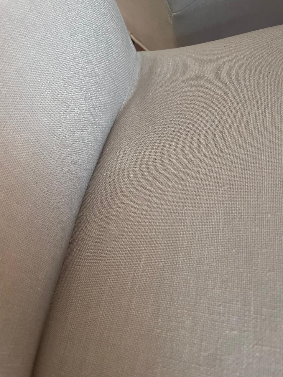 Close-up of a dining chair seat and back corner