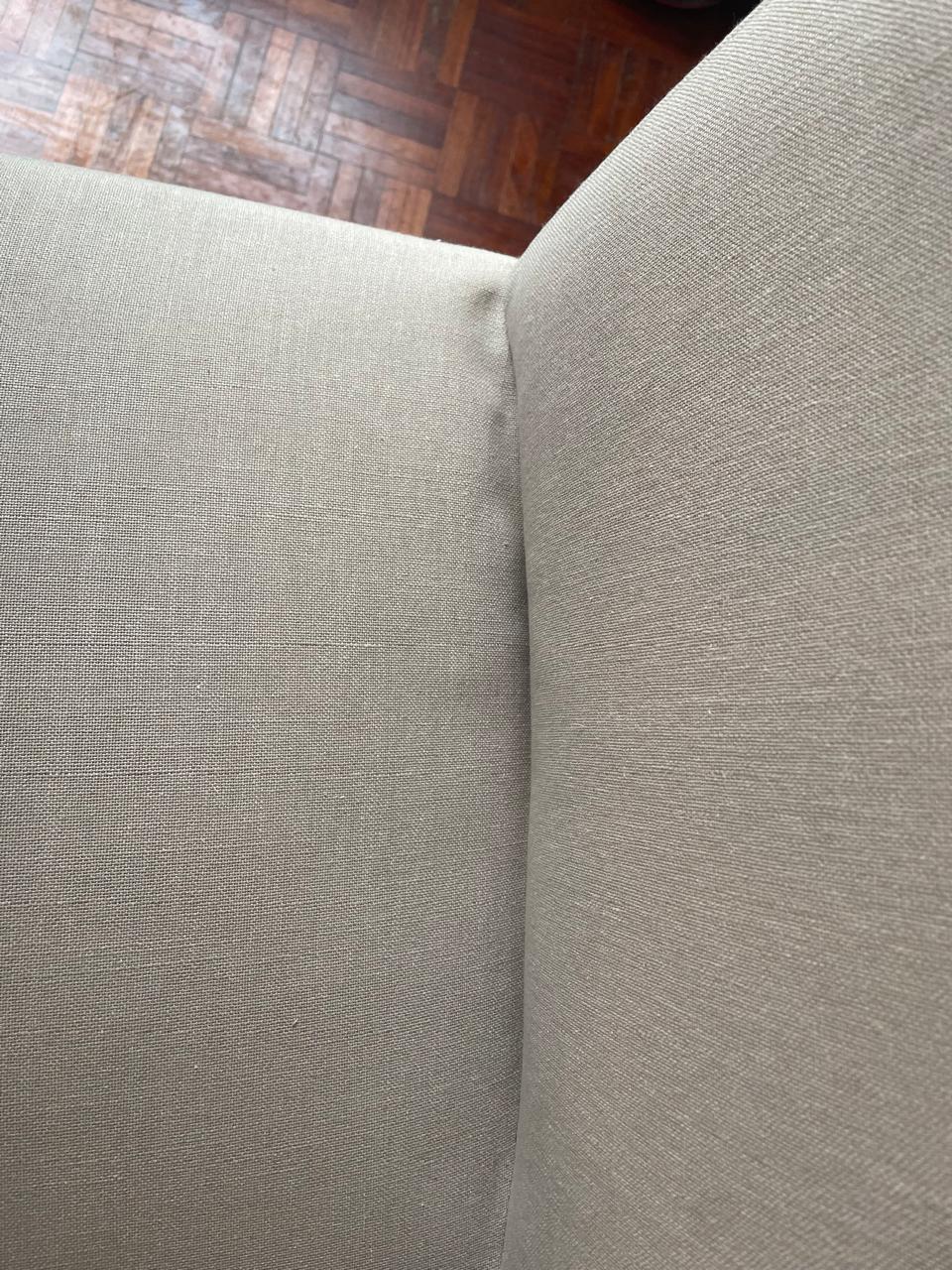 Close-up of fabric finishing at the inside corner of a dining chair