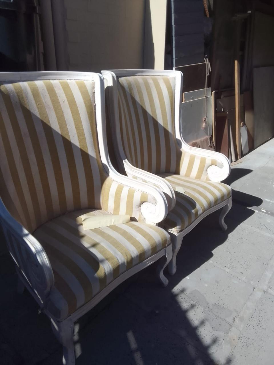 Two striped occasional chairs photographed after the work